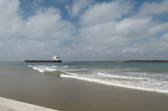 PortAransas_Channel_PanamaShip_wave_JulianneGCrane