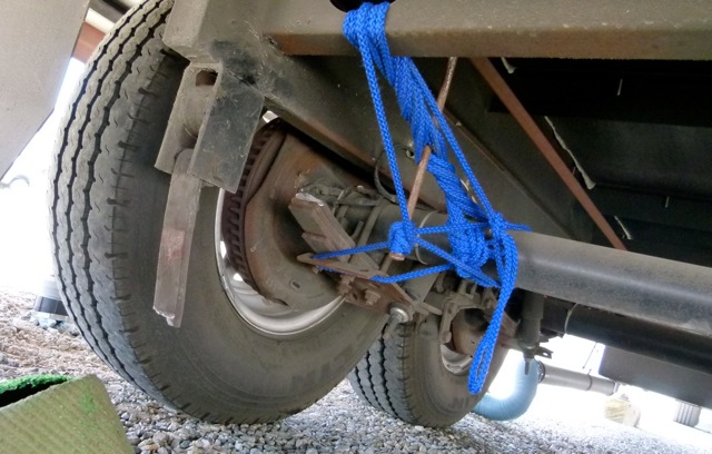 Temporary fix of broken spring to get 5th wheel to repair place