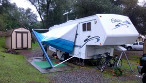 Up goes the new RV awning, with the help of seven great SKP neighbors