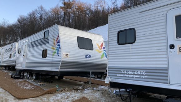 Austrian Olympic team’s support staff live in recreation vehicles during winter games